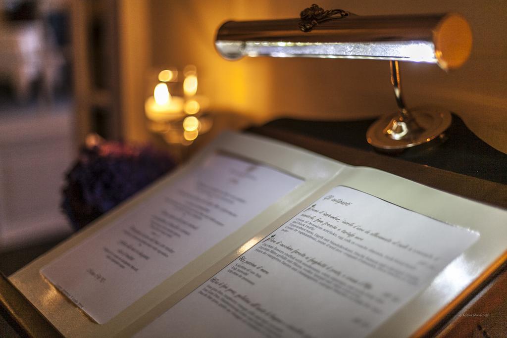 Hotel Splendide Royal Lugano Buitenkant foto A lamp on a piano
